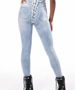 ALL OVER LACE UP BACK SKINNY JEANS -FINESSE-shop all over lace up back skinny jeans light blue denim 1 1 c1