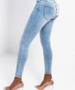 ALL OVER LACE UP BACK SKINNY JEANS
