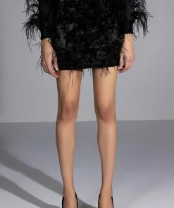 LIVING IT UP SATIN AND SPIKES FEATHER MINI SKIRT