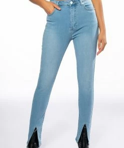 NIGHTFALL MID RISE SKINNY JEANS WITH FRONT SLIT