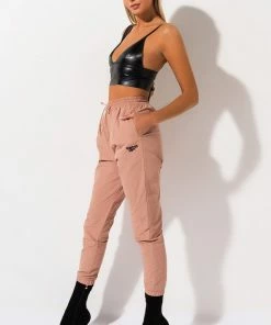 REEBOK X GIGI HADID WOVEN TRACK PANT 6 REEBOK X GIGI HADID WOVEN TRACK PANT -FINESSE-shop reebok x gigi hadid woven track pant field tan 3c1