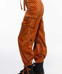 UNCOVERING YOUR TRACKS CHECKERED PU CARGO PANTS 12 UNCOVERING YOUR TRACKS CHECKERED PU CARGO PANTS -FINESSE-shop uncovering your tracks cargo pants rust 5 5